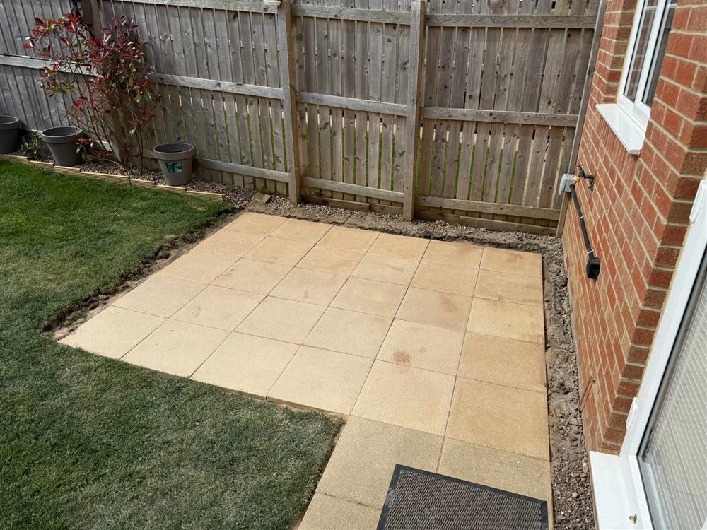 New patio paving with lawn
