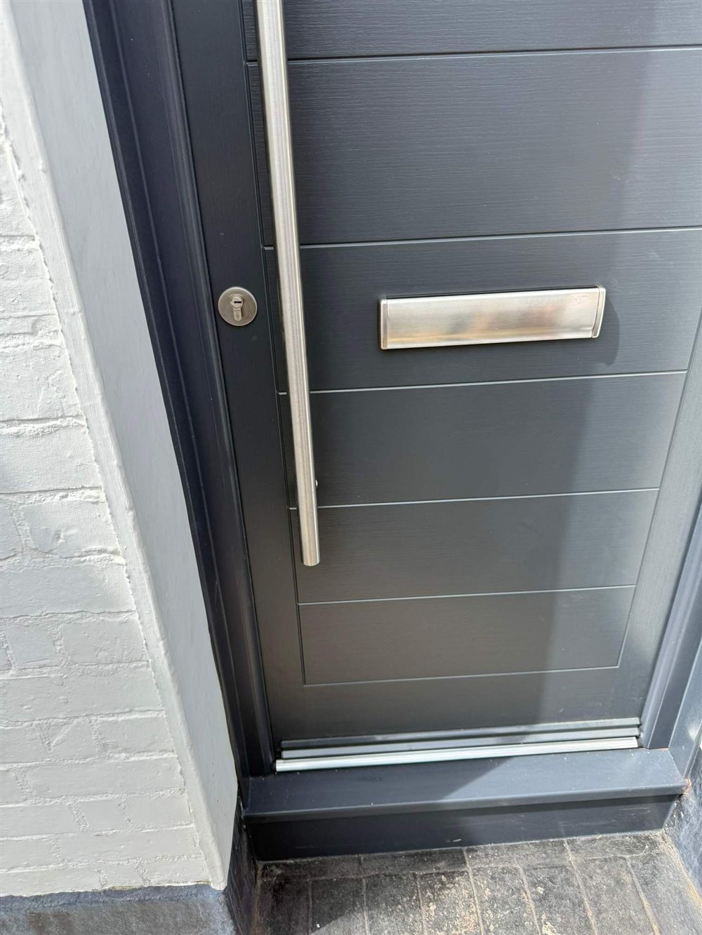 New composite front door installation