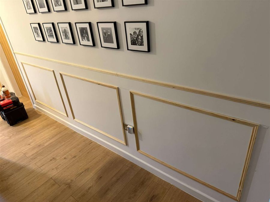 Decorative wall panelling and oak flooring fitted by Parker & Dodds