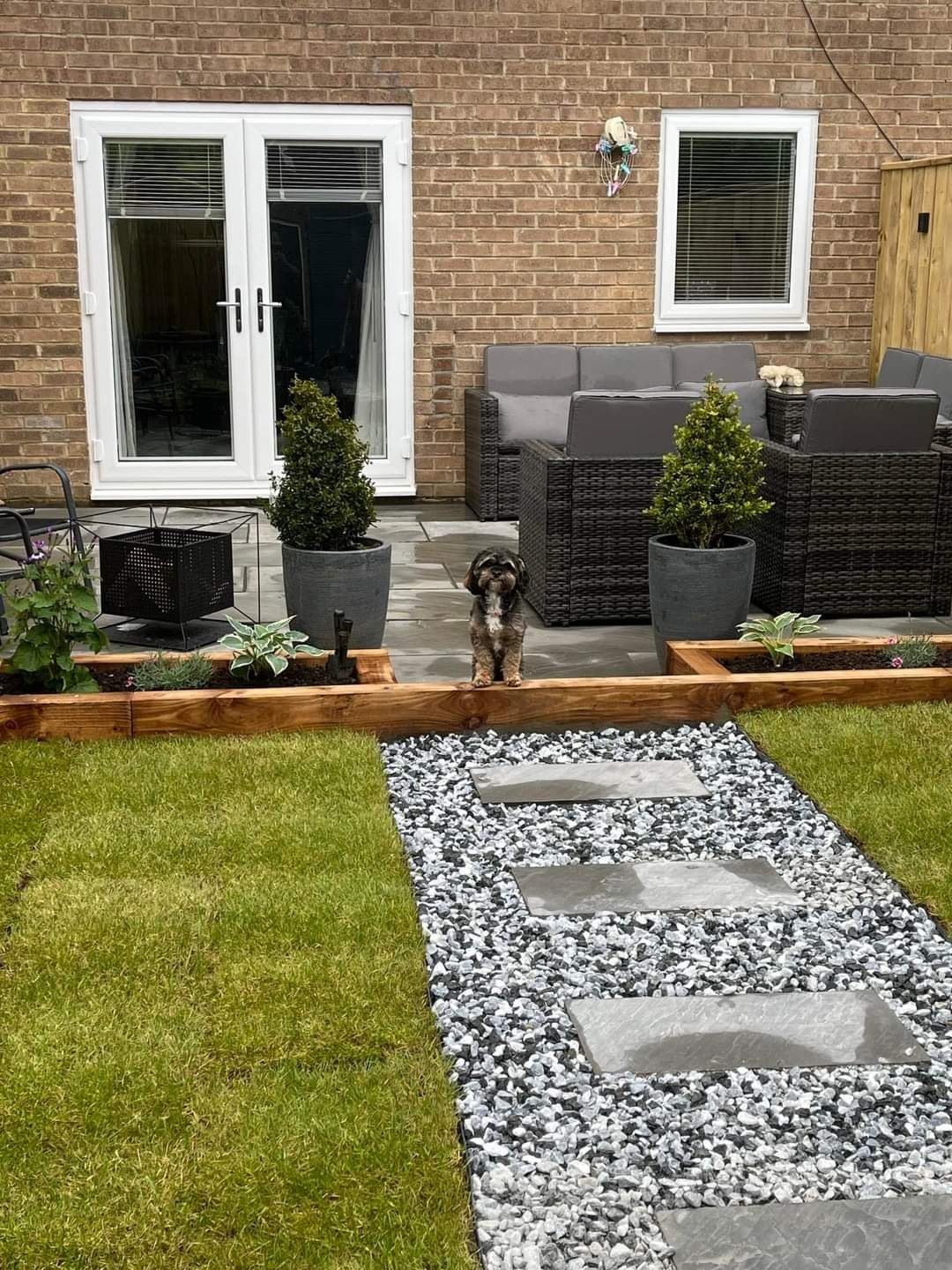 Landscaped garden with sleepers and stepping stones